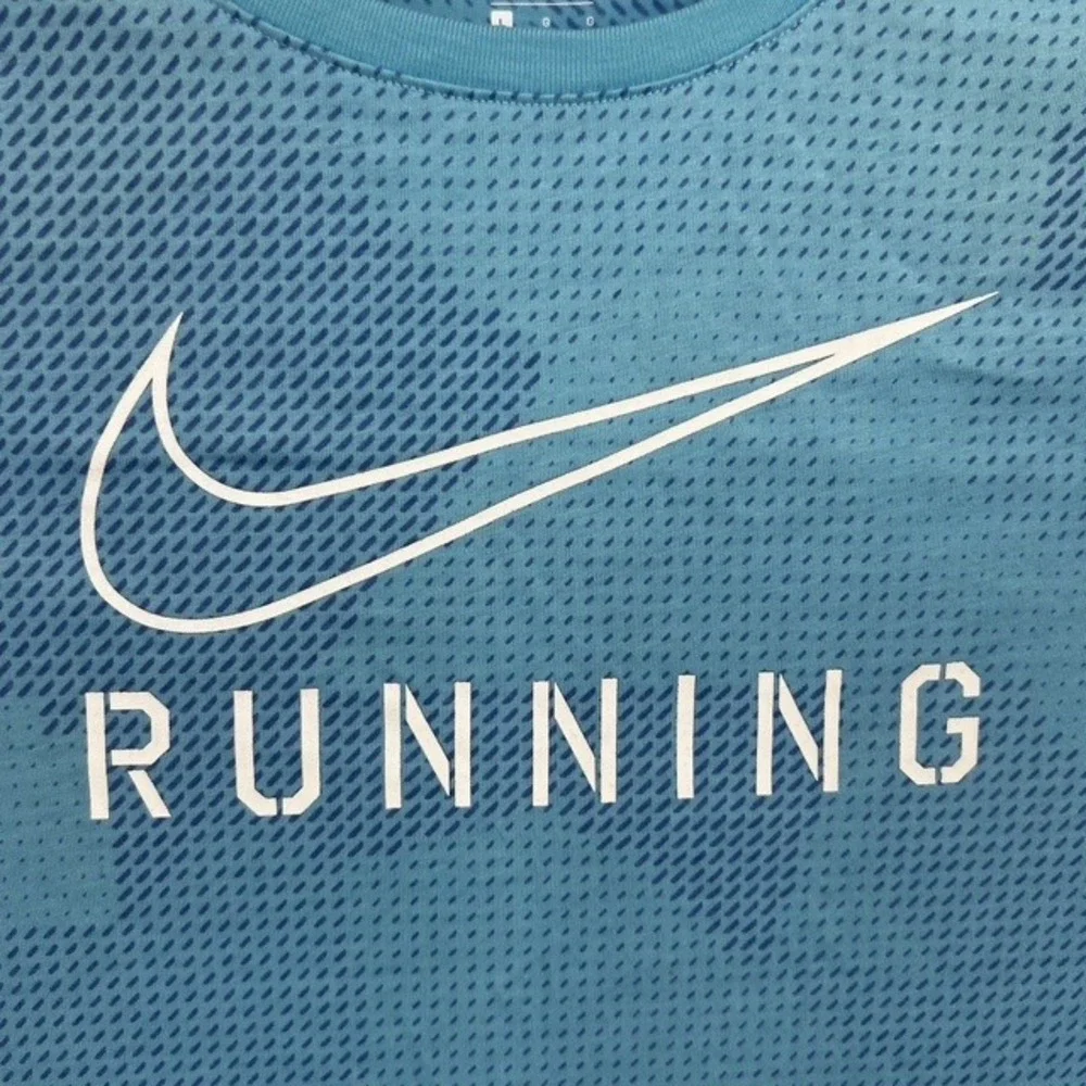 Nike Women's Large Dri-FIT Blue Geometric Camo Running T-Shirt Athletic Cut